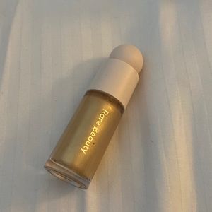 Rare beauty highlighter in the shade outshine